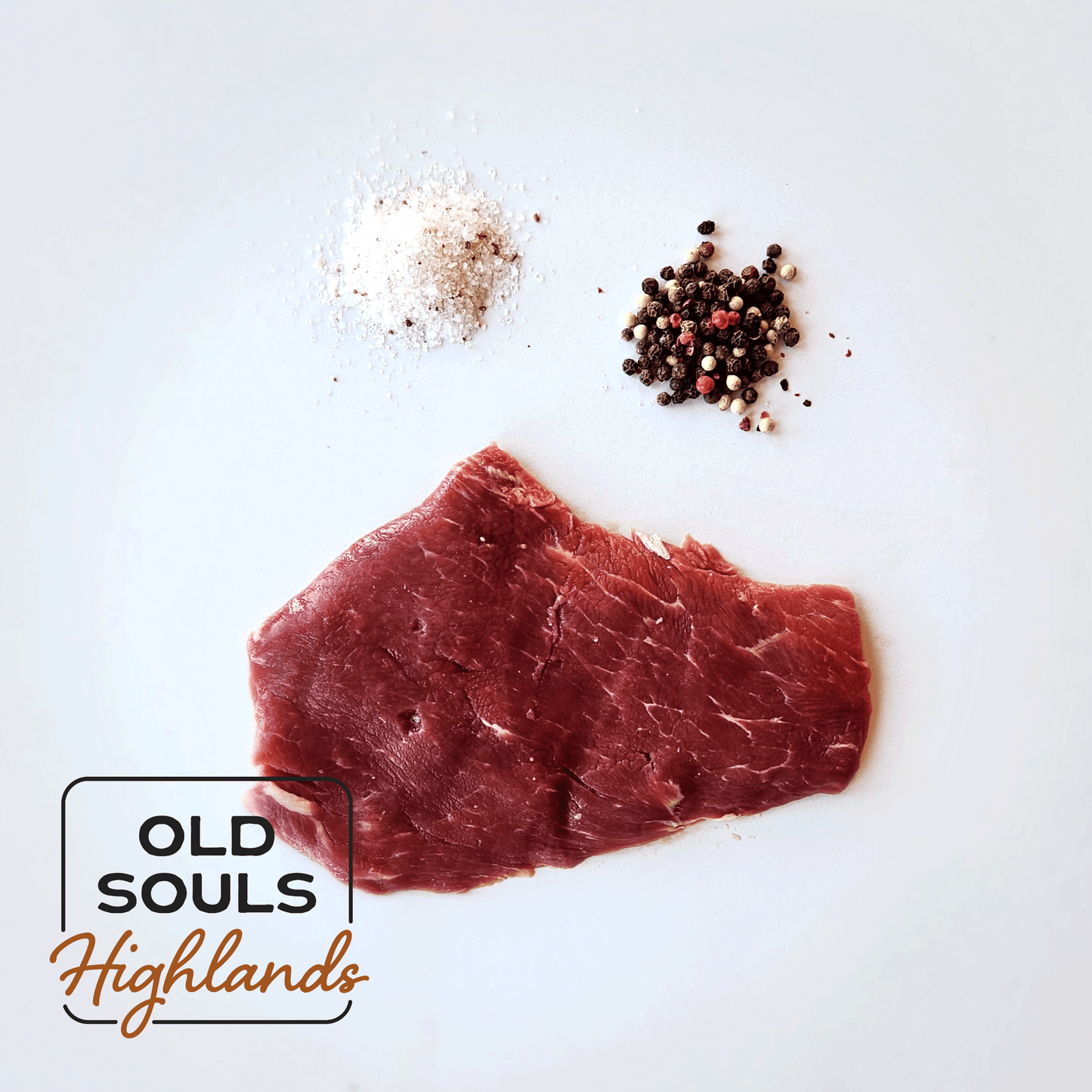 Image of premium highland beef, flat iron steak cut