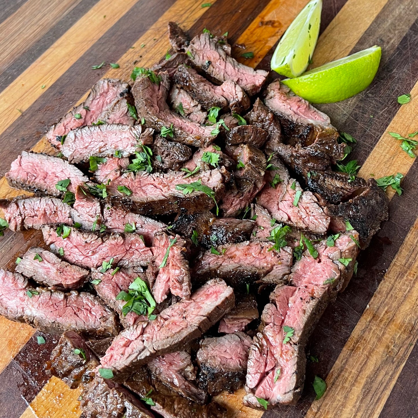 Image of premium highland beef, skirt steak cut, cooked with cilantro and lime