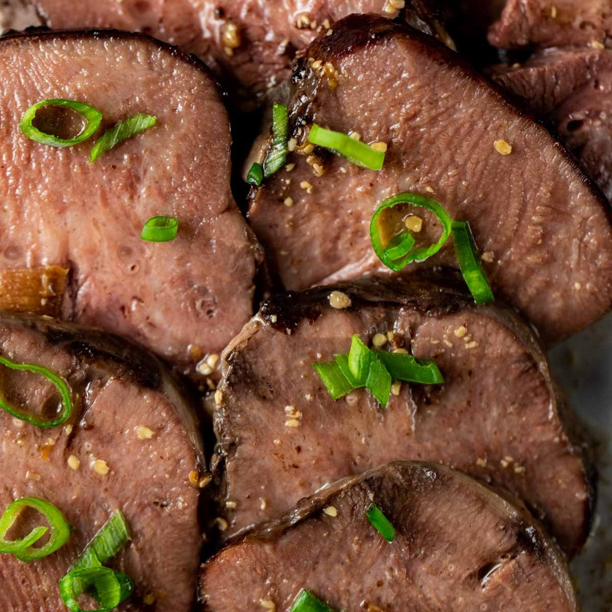 Image of premium highland beef, tongue cut, roasted with scallions